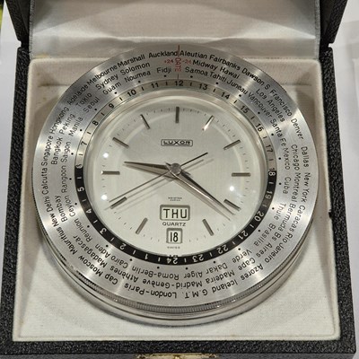 Lot 50 - A vintage Luxor Piston head form desk clock...