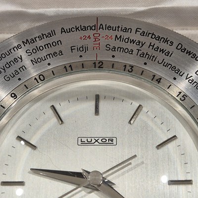 Lot 50 - A vintage Luxor Piston head form desk clock...