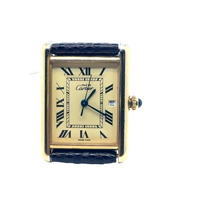 Lot 55 - Cartier tank watch. silver-gilt case with...
