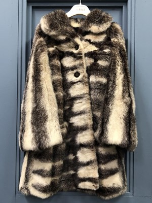 Lot 143 - Clothing - Christian Dior, Fourrure. A striped...