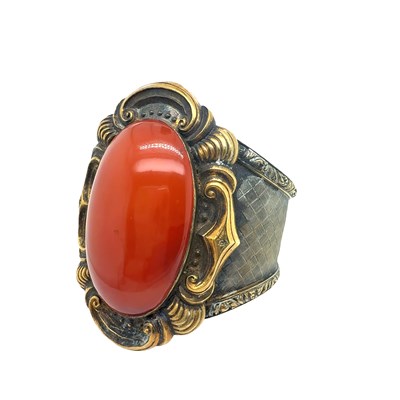 Lot 61 - An antique silver gilt hinged cuff bangle, set...