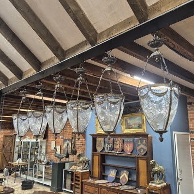 Lot 650 - A set of six large gilt brass-mounted Cut...