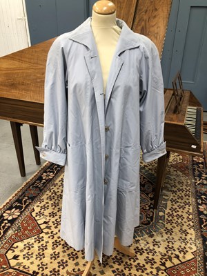 Lot 133 - A light blue rain mac by Harrods size 36