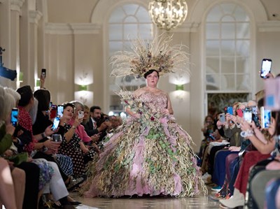 Lot 128 - Bloom reborn. This captivating dress is...