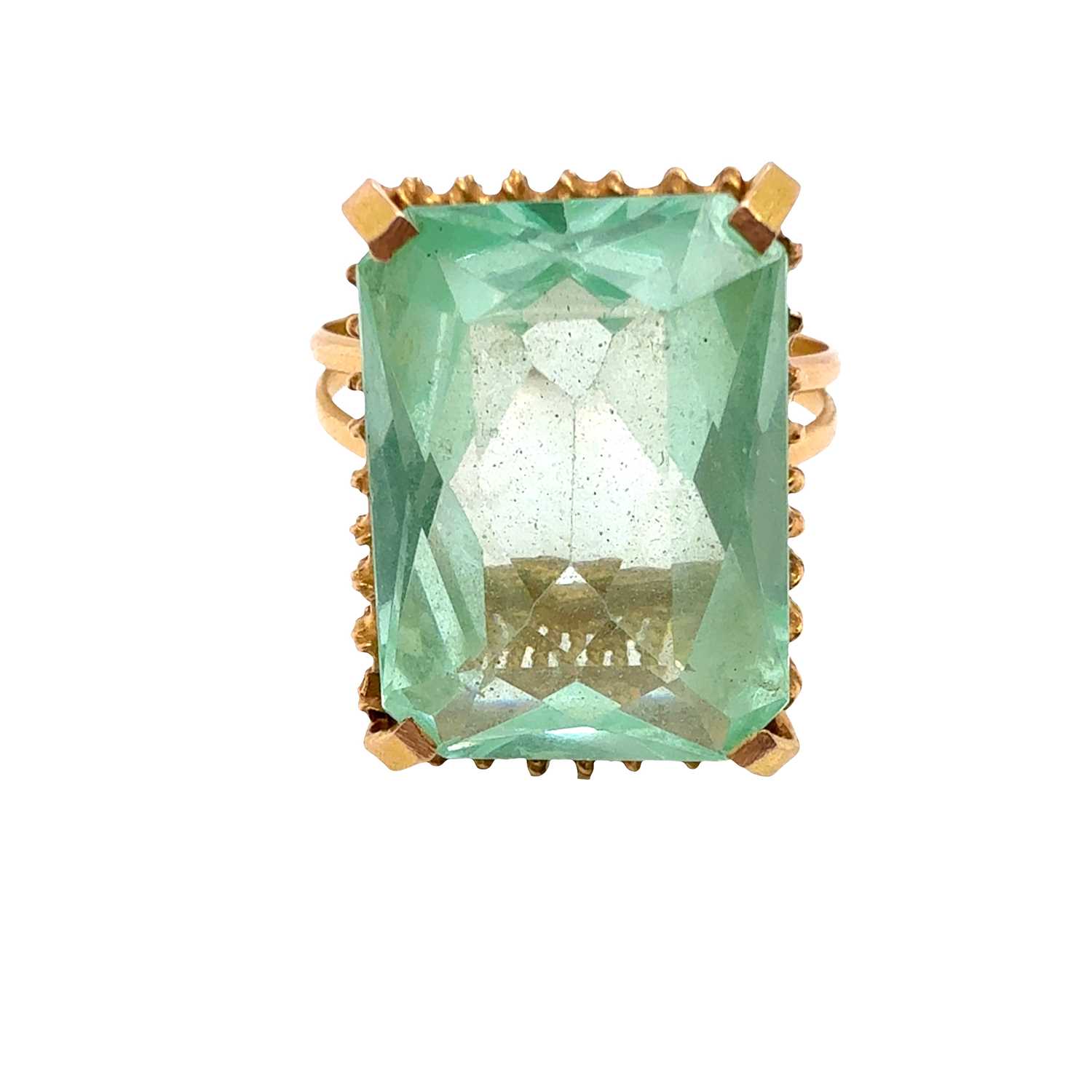 Lot 71 - A gem-set cocktail ring with a large pale...