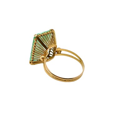 Lot 71 - A gem-set cocktail ring with a large pale...