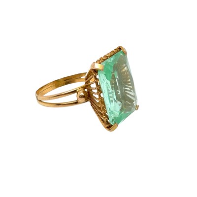 Lot 71 - A gem-set cocktail ring with a large pale...