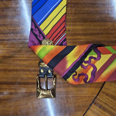 Lot 141 - Versace silk scarf belt with Medusa buttons.