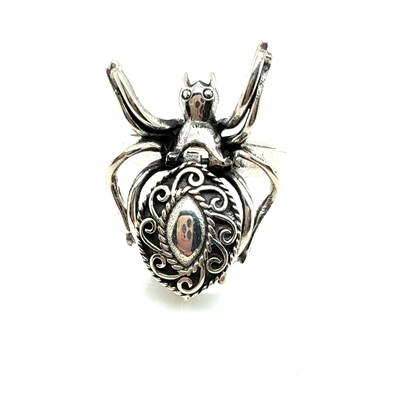 Lot 82 - A spider "poison" ring with a scroll-worked...