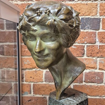 Lot 195 - A French Art Deco bronze Bacchante Portrait...