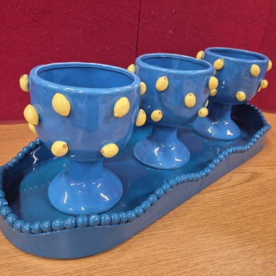 Lot 247a - A contemporary trio of blue glazed goblet...