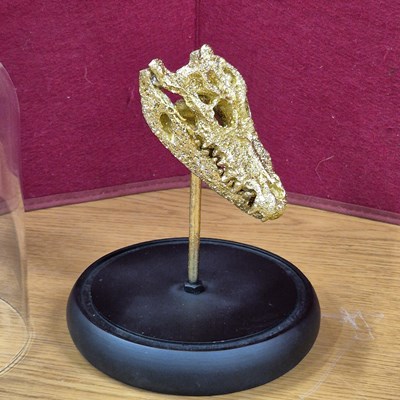 Lot 95 - A decorative sculpture of a gilded alligator...