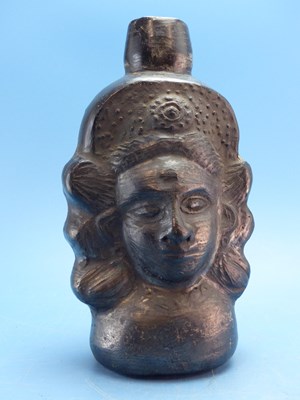 Lot 238 - An unusual patinated terracotta two-faced...