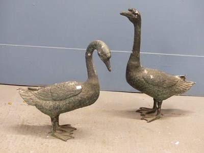 Lot 240 - A pair of life-size bronzed figures of geese.