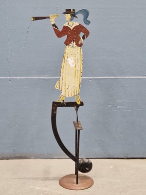 Lot 230 - A vintage style rocking tinplate figure...