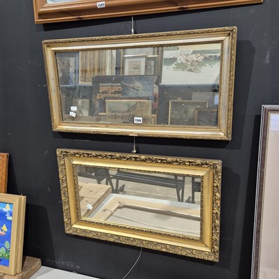Lot 1548 - Two gilt-framed mirrors.