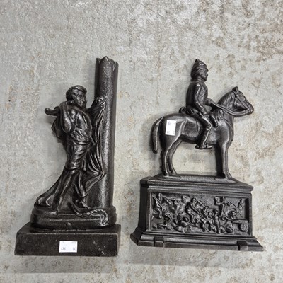 Lot 336a - Two 19th-century cast-iron doorstops