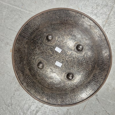 Lot 205a - An antique Indo-Persian shield with engraved...