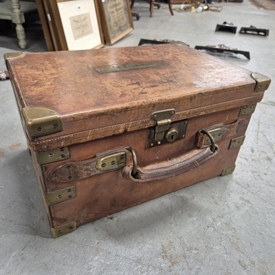 Lot 227a - A large antique oak and leather cardridge...