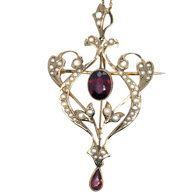 Lot 1012 - An antique Edwardian pendant brooch in 9ct...