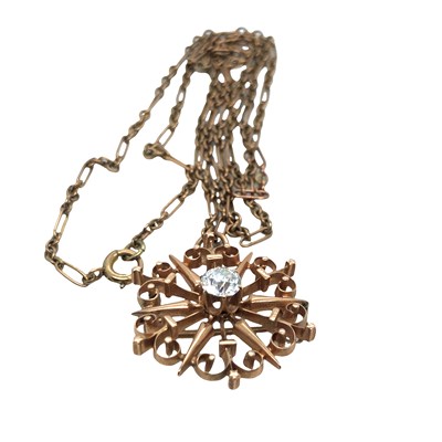 Lot 1013 - An antique pendant brooch in unhallmarked 9ct...