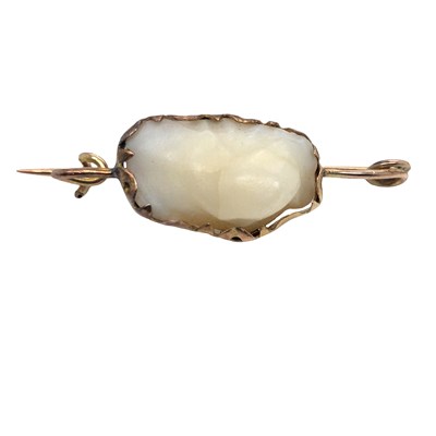 Lot 1006 - An Art Nouveau style bar brooch set with three...