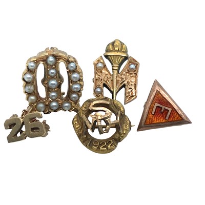 Lot 1014 - A set of early 20th-century lapel and award...