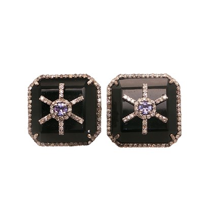 Lot 1016 - A pair of unusual silver square stud earrings...