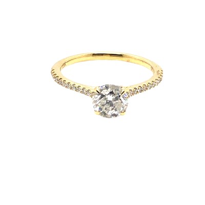 Lot 1017 - An 18ct yellow gold round brilliant cut...