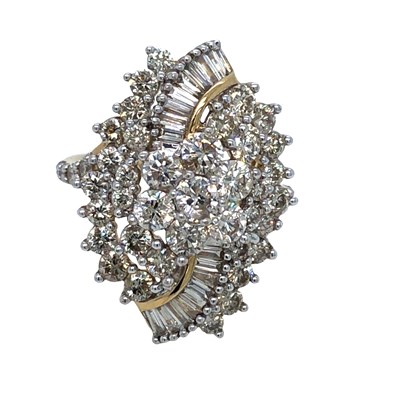 Lot 1022 - A large 10ct yellow gold cluster ring set with...