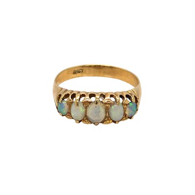 Lot 1041 - A vintage half-hoop ring set with five...