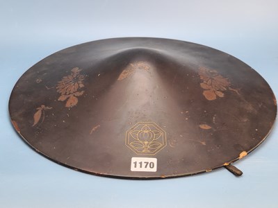 Lot 1170 - A Japanese black lacquer hat gilt with a...