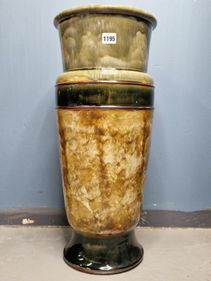 Lot 1195 - A Doulton stoneware stick stand glazed in...