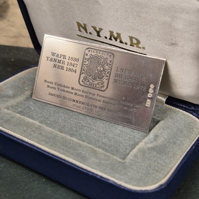 Lot 1198 - A cased silver commemorative Whitby &...