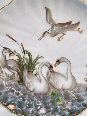 Lot 1206 - A Meissen 'Swan' service plate, crossed swords...