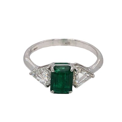 Lot 1045 - An 18ct white gold ring set with a rectangular...