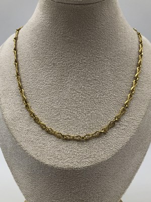Lot 1090 - An open-work filigree link necklace,...
