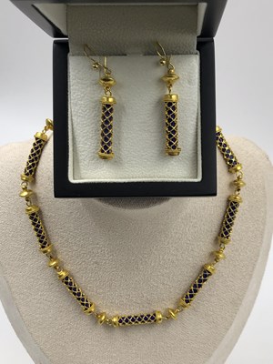 Lot 1092 - A late 20th-century Middle Eastern gold...