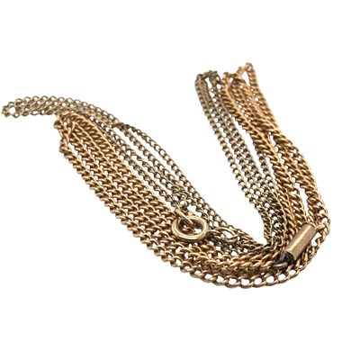 Lot 1094 - A vintage rose gold curb chain fitted with a...