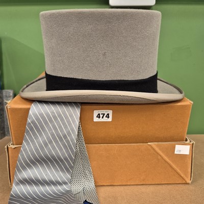 Lot 474 - A Moss Bros 7 1/4 size grey top hat together...