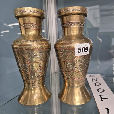 Lot 509 - A pair of Cairo style silver and copper...