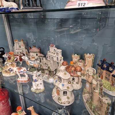 Lot 513 - A collection of Stafforshire pottery castles...