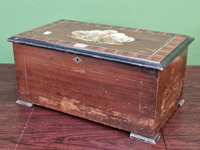 Lot 1215 - A Swiss music box playing ten airs on a...