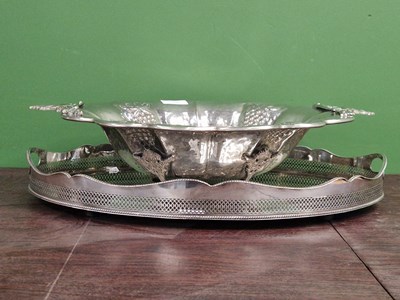 Lot 1232 - An electroplate oval galleried tray together...