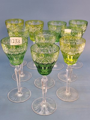 Lot 1233 - A set of ten green overlay wine glasses
