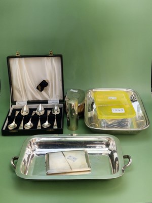 Lot 1243 - A cased set of six silver grapefruit spoons,...