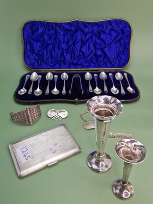 Lot 1245 - A cased set of twelve tea spoons with tongs by...