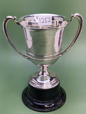 Lot 1252 - A silver two handled trophy cup and wood stand...