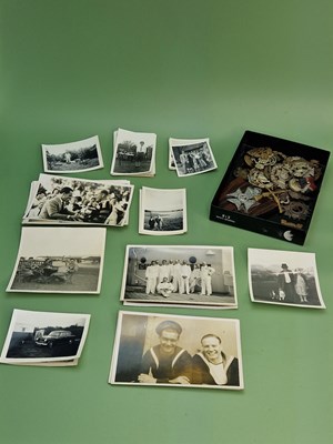 Lot 1253 - A small collection of cap badges together with...