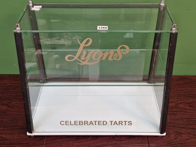 Lot 1268 - A Lyons table top display cabinet with glass...